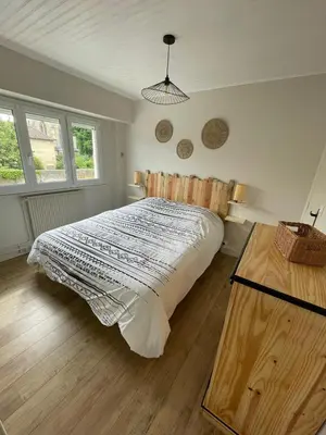 Un ou plusieurs lits dans un hébergement de l'établissement Appartement à 100m de la plage