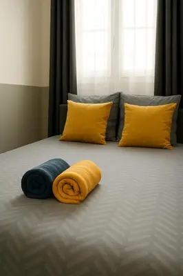 Un ou plusieurs lits dans un hébergement de l'établissement Studette Sable & Mer cosy à 100m de la plage