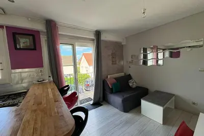 Coin salon dans l'établissement Beautiful apartment near Ouistreham beach