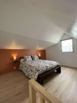 Un ou plusieurs lits dans un hébergement de l'établissement Maison proche des plages du DDay