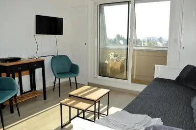 Un ou plusieurs lits dans un hébergement de l'établissement L'Escale - Studio avec loggia en centre ville