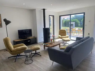 Télévision ou salle de divertissement dans l'établissement Holiday Home Les lilas by Interhome