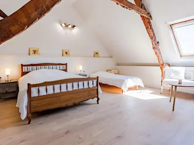 Un ou plusieurs lits dans un hébergement de l'établissement Holiday Home Les Moutons by Interhome