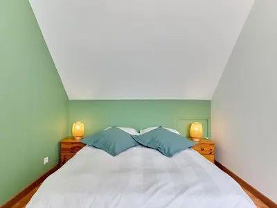 Un ou plusieurs lits dans un hébergement de l'établissement Holiday Home Le Lanchon by Interhome