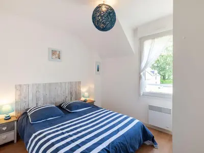 Un ou plusieurs lits dans un hébergement de l'établissement Holiday Home Oscar by Interhome