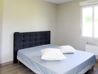Un ou plusieurs lits dans un hébergement de l'établissement Holiday Home les Dunes du Havre by Interhome