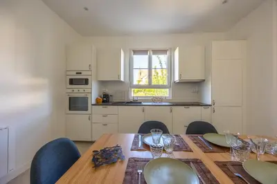 Cuisine ou kitchenette dans l'établissement La Maison du Fleuve - Welkeys