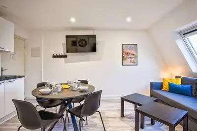 Cuisine ou kitchenette dans l'établissement Bel Appartement Cabourg