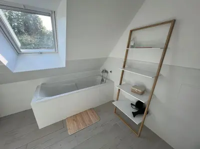 Salle de bains dans l'établissement Les Côtes Normandes
