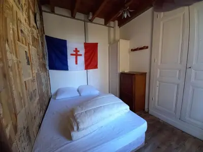 Un ou plusieurs lits dans un hébergement de l'établissement maison Andrew TUCK III