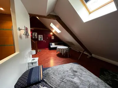 Coin salon dans l'établissement Charmante Maison