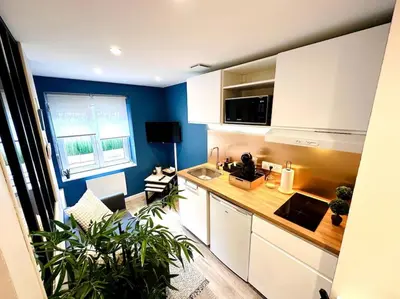 Cuisine ou kitchenette dans l'établissement Le Bleu du Mont