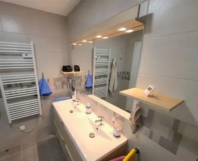 Salle de bains dans l'établissement Le Littoral