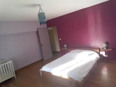 Un ou plusieurs lits dans un hébergement de l'établissement Holydays House, maison en Normandie, Manche,