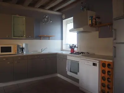 Cuisine ou kitchenette dans l'établissement Gite de la petite maison