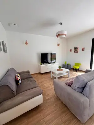 Coin salon dans l'établissement Maison Privée, Calme, parking, Jardin