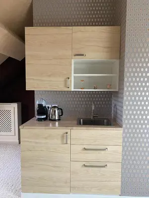 Cuisine ou kitchenette dans l'établissement La chambre de Mathilde