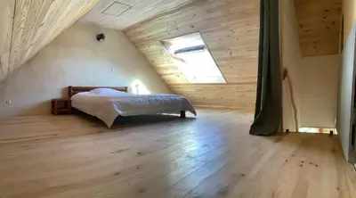Un ou plusieurs lits dans un hébergement de l'établissement Gîte de la Ressourcery