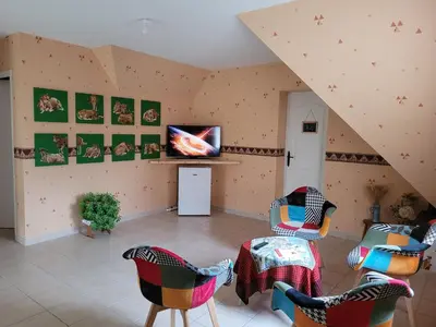 Télévision ou salle de divertissement dans l'établissement OSY Normandy
