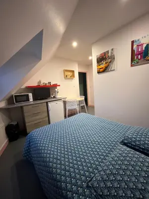 Un ou plusieurs lits dans un hébergement de l'établissement les moulins - chambre 2