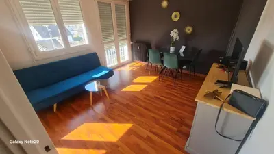 Coin salon dans l'établissement Appartement à 1km de la gare de Caen et 9 Kms de la plage