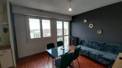 Coin salon dans l'établissement Appartement à 1km de la gare de Caen et 9 Kms de la plage