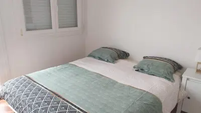 Un ou plusieurs lits dans un hébergement de l'établissement Appartement à 1km de la gare de Caen et 9 Kms de la plage