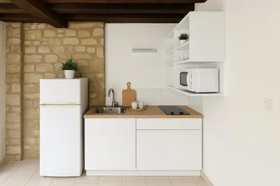 Cuisine ou kitchenette dans l'établissement Le Nid d Abbaye