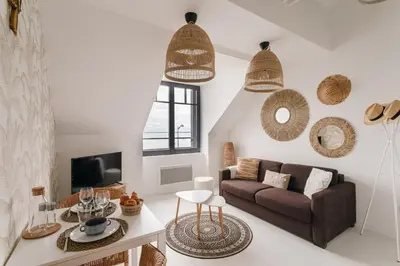 Coin salon dans l'établissement Ty Peskaiden 2 - Appt vue mer à Cancale