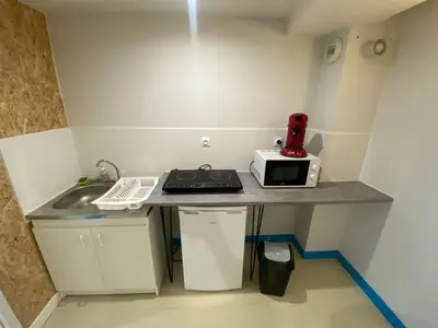 Cuisine ou kitchenette dans l'établissement appart 8 -les moulins