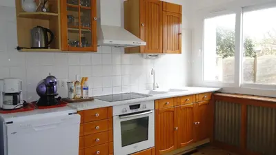 Cuisine ou kitchenette dans l'établissement gite de mer familial, plage et commerces à pied