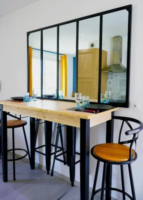 Cuisine ou kitchenette dans l'établissement Cosy Gare