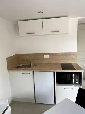 Cuisine ou kitchenette dans l'établissement Grange à la campagne