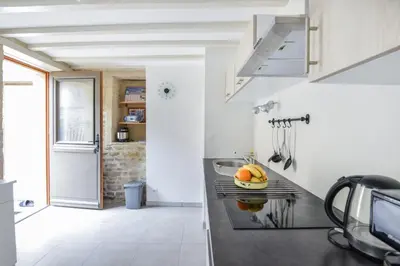 Cuisine ou kitchenette dans l'établissement L'Écrin de Douvres - Charmante maison pour 2p