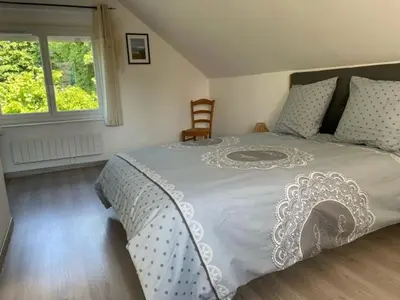 Un ou plusieurs lits dans un hébergement de l'établissement Gite Amandine