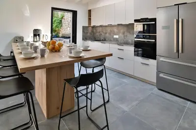 Cuisine ou kitchenette dans l'établissement La Villa des Fontenelles - Proche de la mer