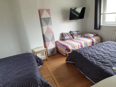 Un ou plusieurs lits dans un hébergement de l'établissement La maison de Nadège