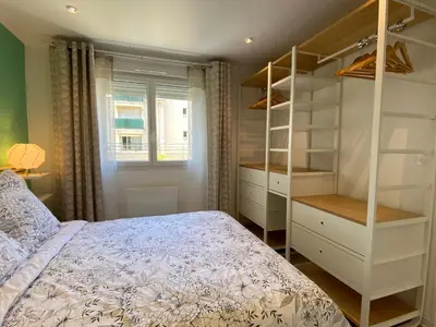 Un ou plusieurs lits dans un hébergement de l'établissement Chaleureux deux pièce coeur de ville avec parking privé
