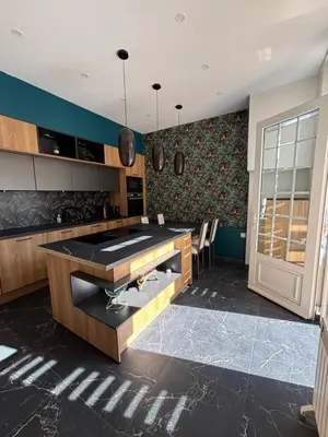 Cuisine ou kitchenette dans l'établissement Appartement élégant au cœur de Cabourg