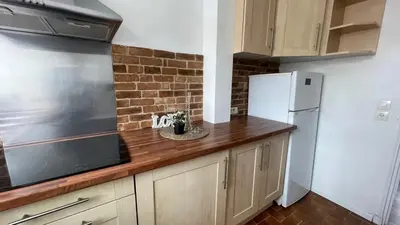 Cuisine ou kitchenette dans l'établissement Appartement spacieux à Caen 65 m² avec balcon vue sur la ville