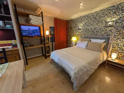 Un ou plusieurs lits dans un hébergement de l'établissement Gourmandise