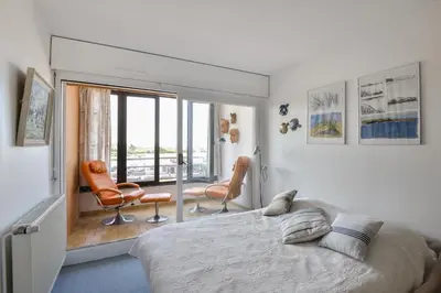 Coin salon dans l'établissement Le Balcon sur Juno - A 10min à pied de la plage