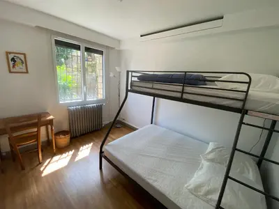 Un ou plusieurs lits dans un hébergement de l'établissement Appartement dans Villa