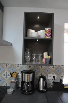 Cuisine ou kitchenette dans l'établissement Les Marais Blancs à Picauville