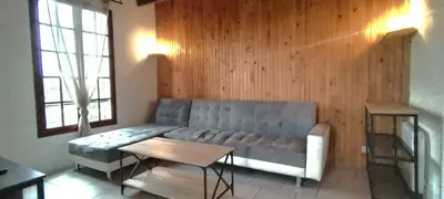 Coin salon dans l'établissement Lotena