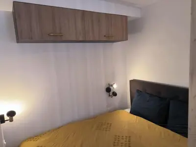 Un ou plusieurs lits dans un hébergement de l'établissement Studio à 100 m de la plage PIQUOT 44