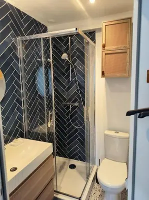 Salle de bains dans l'établissement Studio à 100 m de la plage PIQUOT 44