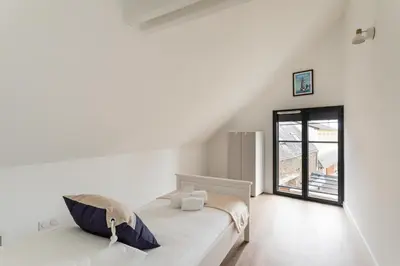 Un ou plusieurs lits dans un hébergement de l'établissement Le Cap Catamaran - Maison pour 6p à Cancale