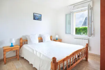 Un ou plusieurs lits dans un hébergement de l'établissement Les Tamaris du Nord - Maison à 300m de la plage