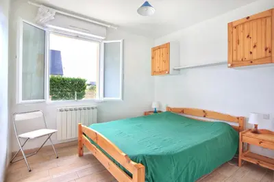 Un ou plusieurs lits dans un hébergement de l'établissement Les Tamaris du Nord - Maison à 300m de la plage